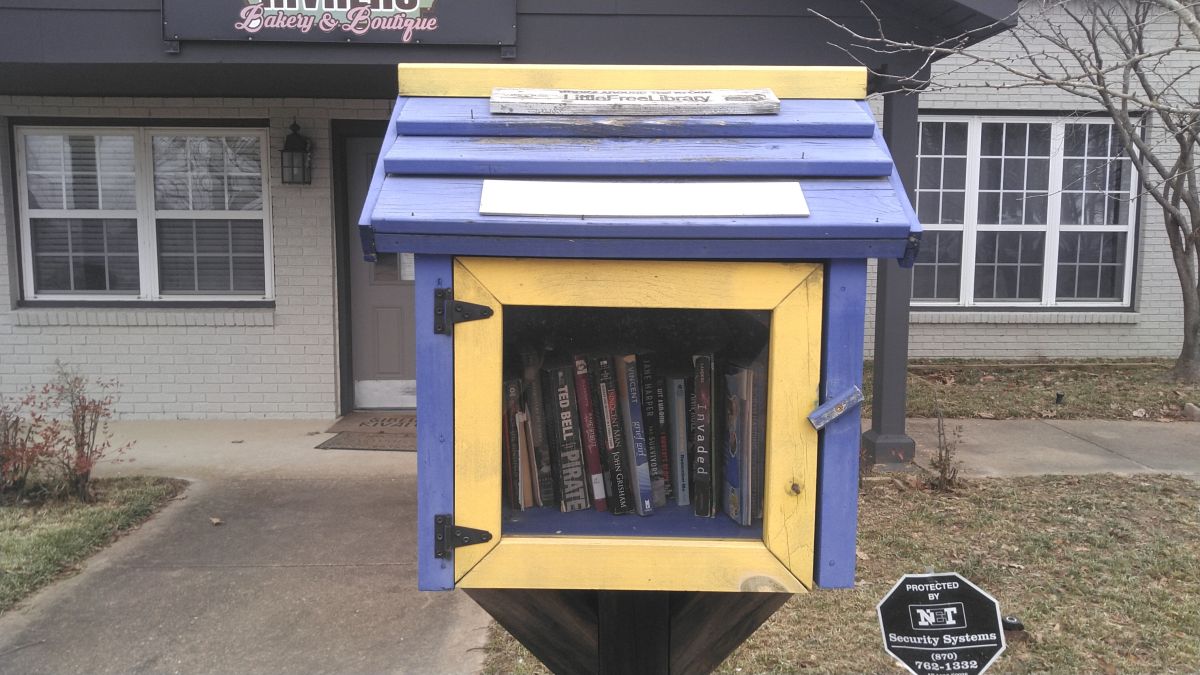 A tiny blue library box where you can leave a book and take a book.